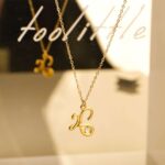 Χειροποίητο Κολιέ-Γούρι 2026 με Ματάκι Σμάλτου & Χρυσή Αλυσίδα - Image 2